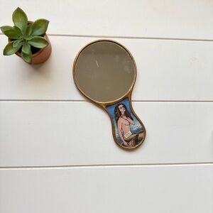 Vintage Gold Hand Mirror with Artistic Design